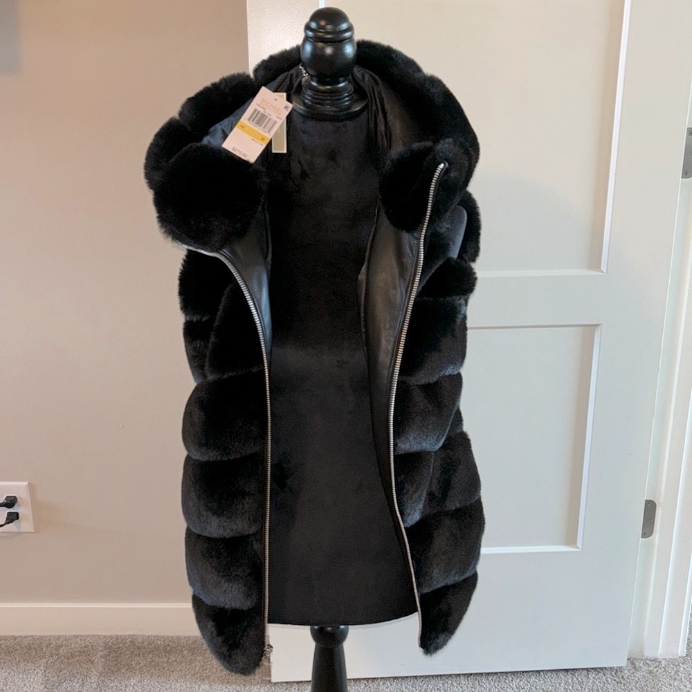 Women’s faux fur Michael Kors vest.